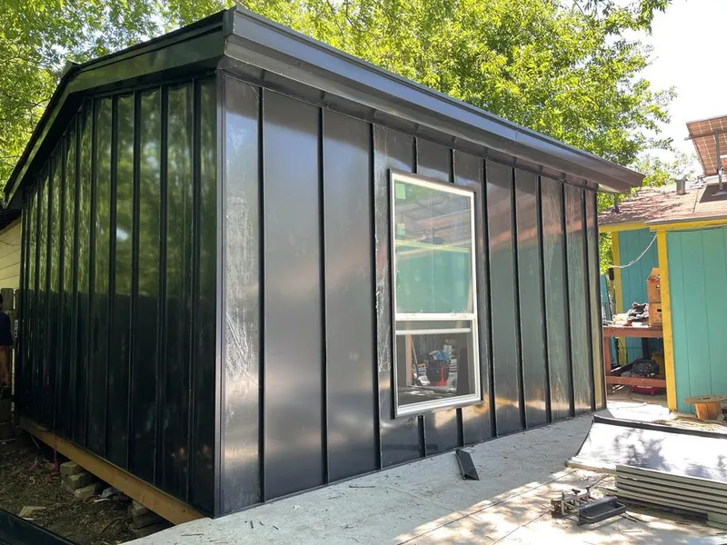 Black standing seam metal wall panels for Metal Roof Installation in South Kensington